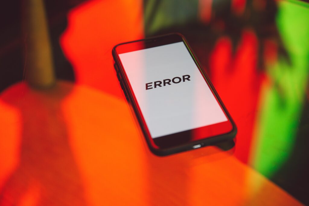 Mobile phone with Error written on it.